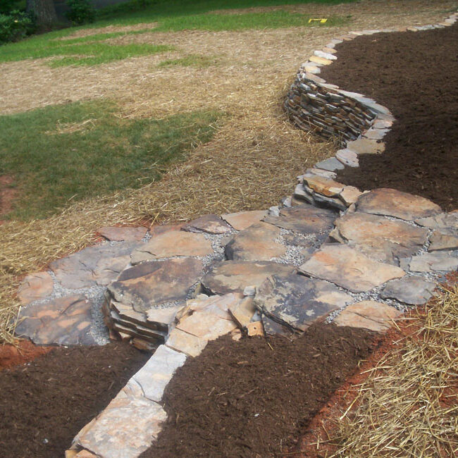 Tennessee boulder step stone stairs through Velvet Gray thin veneer retaining wall