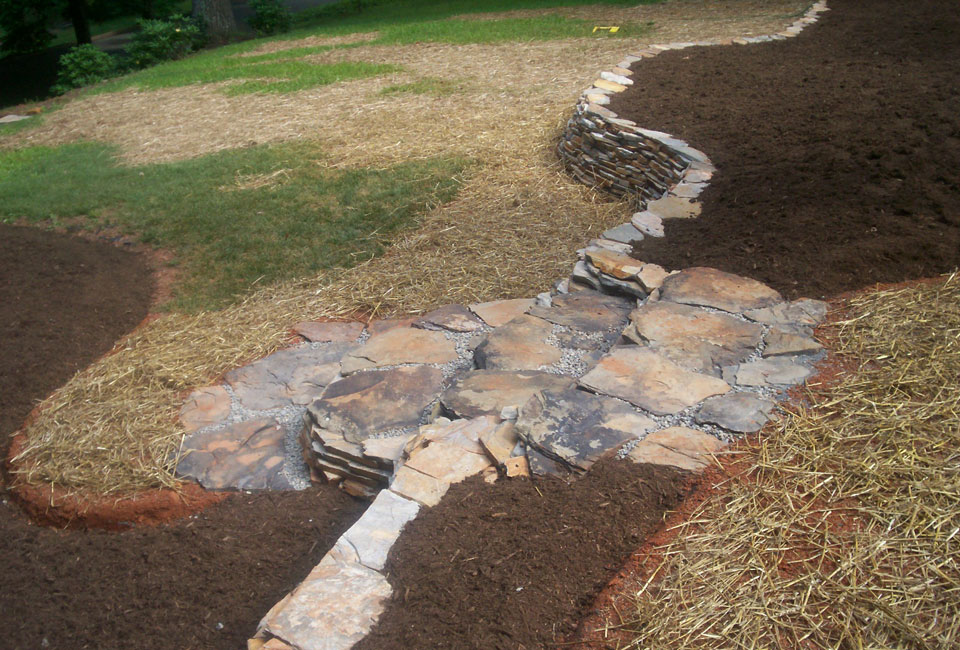 Tennessee boulder step stone stairs through Velvet Gray thin veneer retaining wall