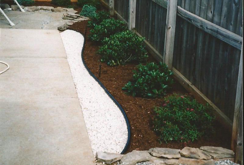 Townhouse Courtyard Small Evergreen Garden Accented w/ White River Rock, PA Bluestone Stepstones & Small PA Bluestone Flagstone Patio w/ outdoor swing & umbrella