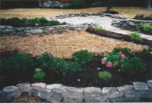 Closer view of small PA Fieldstone Retainers w/ Shrubbery & Sitting Area Patio at End of PA Bluestone Flagstone Walkway